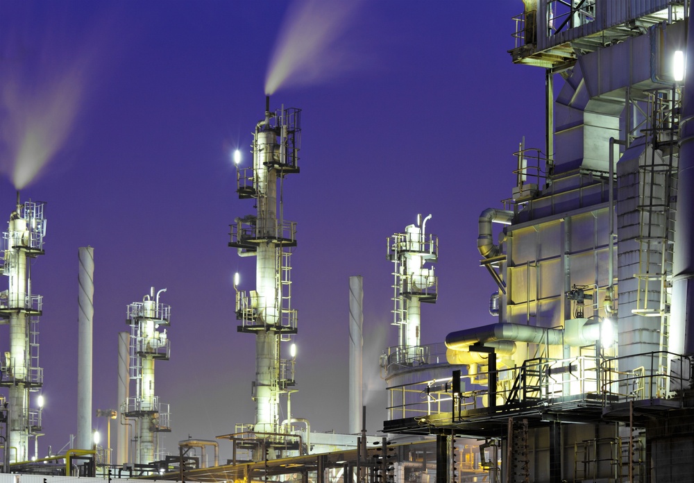 Oil refinery plant at night.jpeg